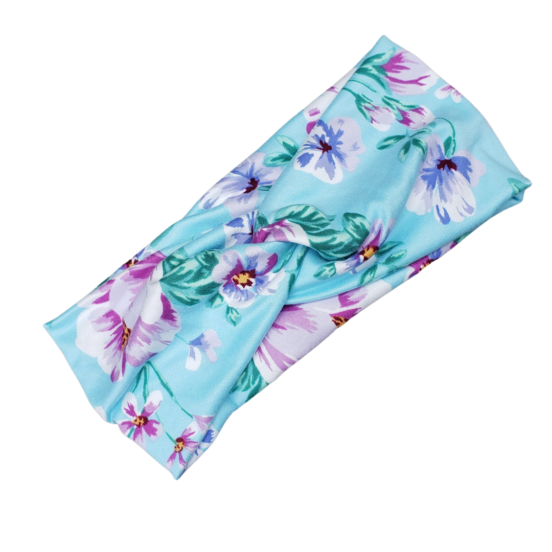 H015  Hawaiian Flowers in Pinks & Purple on a Blue background Headband